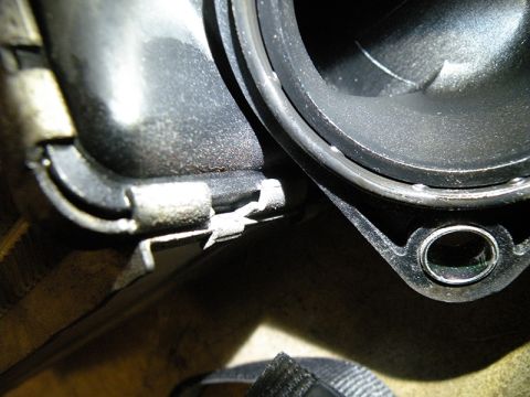 2006 Subaru Legacy - A detailed view of a vehicle's engine component, possibly an intake manifold or intercooler connection.