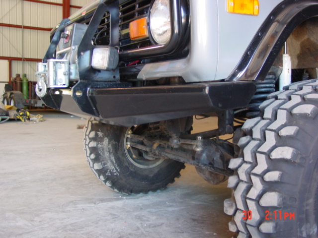 1978 Ford Bronco front end with winch, aftermarket bumper, and large tires
