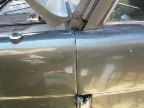 1975 Ford Bronco - The door already rubbed because of the Rhino on the threshhold, but now it REALLY hits - there's about 1/4" droop just before it goes…