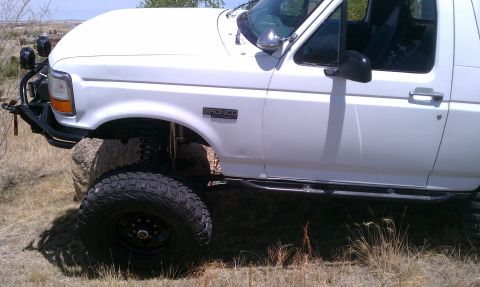 1978 Ford Bronco - This white Ford Bronco is equipped for off-road adventures with large tires and a custom bumper.