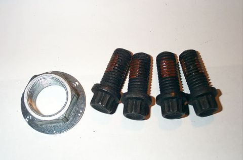 1990 Ford Bronco - Four bolts and a flanged nut are shown against a white background.