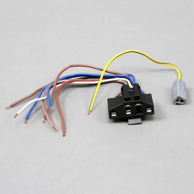 1990 Ford Bronco - A wiring harness connector with a gray plug and several colored wires is shown against a neutral background.