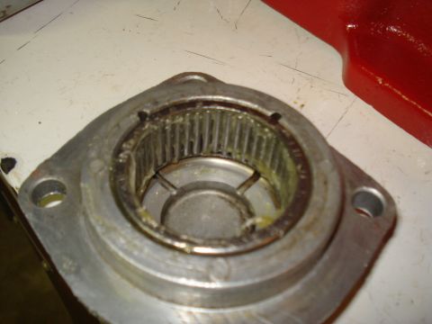 1991 Ford Bronco - This image shows a close-up of a worn bearing race, likely from a vehicle's drivetrain or axle component.