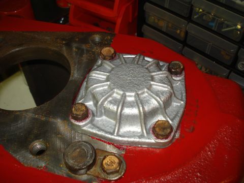 1991 Ford Bronco - Close-up of a differential cover with visible gasket sealant and mounting hardware.