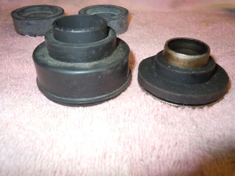 1972 Chevrolet Camaro - Rubber suspension parts, possibly for a Chevrolet vehicle, are laid out on a pink cloth.