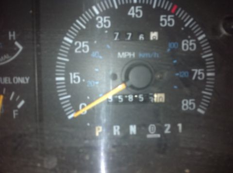 1990 Ford Bronco - Dashboard gauges for a 1990 Ford Bronco display mileage and gear selection.