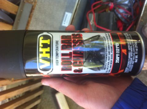 1990 Ford Bronco - A can of VHT spray paint designed for roll bars and chassis is held in a hand.