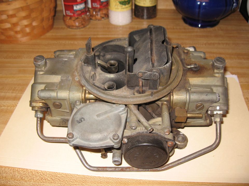 Holley carburetor with metal fuel lines attached