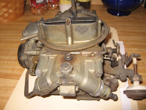 1968 Shelby GT500 - Close-up view of a Holley carburetor, a key component in older internal combustion engines.