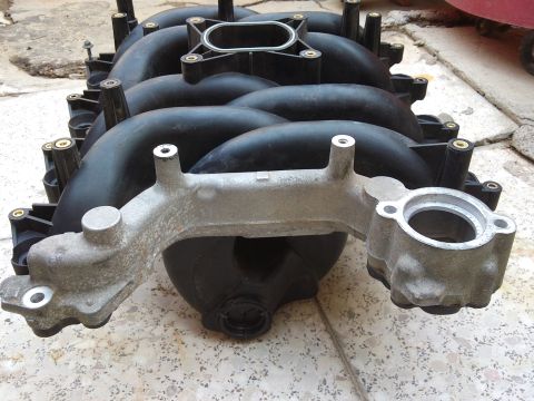 1998 Ford Crown Victoria - This is an intake manifold, likely for a Ford vehicle, but not a 1998 Crown Victoria.
