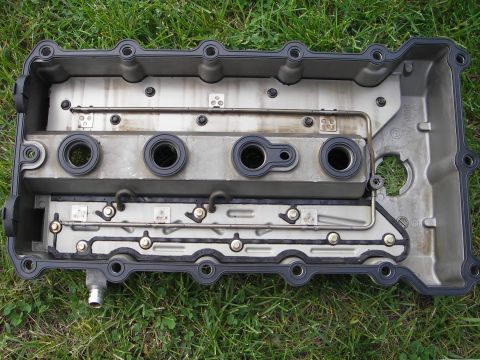 1996 BMW Z3 - inside the cover has oil spray tubes for the cam lobes, the transfer seal is dealer only