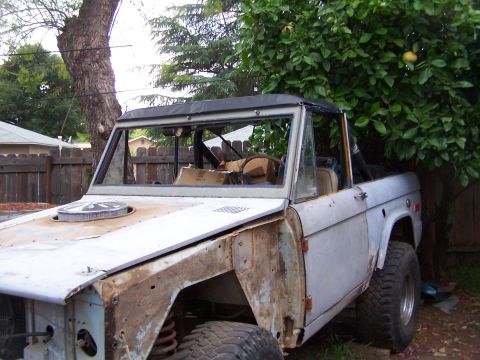 1973 Ford Bronco - This 1973 Ford Bronco is shown in primer gray with a soft top, awaiting body work.