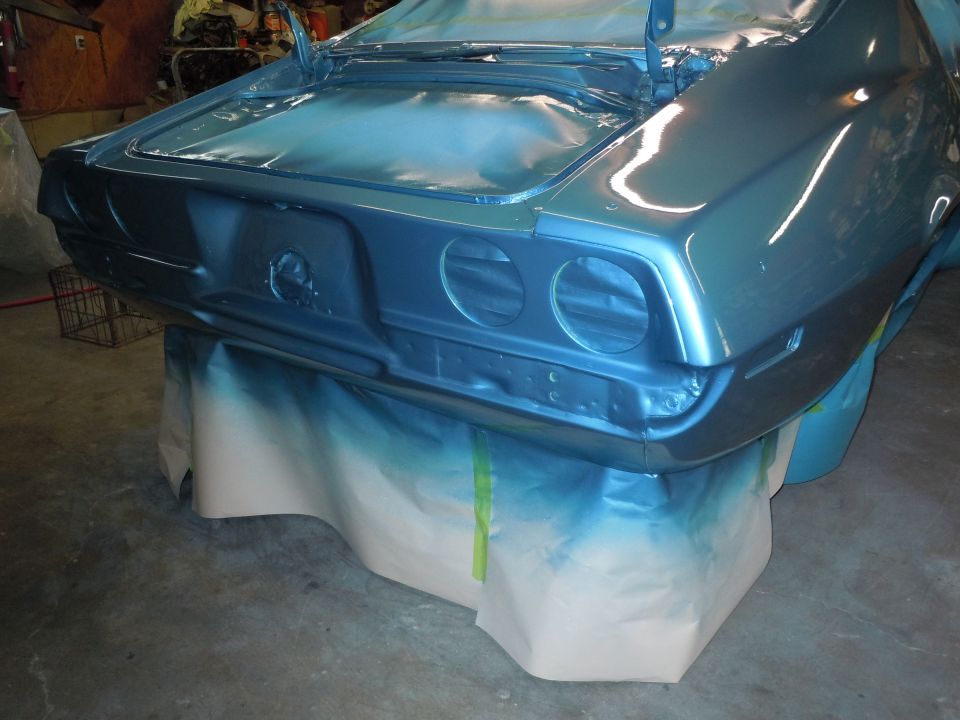 Rear of a 1972 Chevrolet Camaro being painted blue