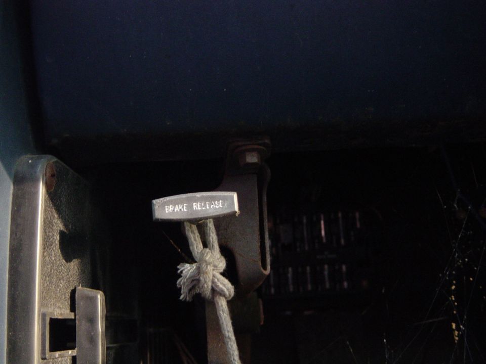 Interior brake release lever with rope tied to it
