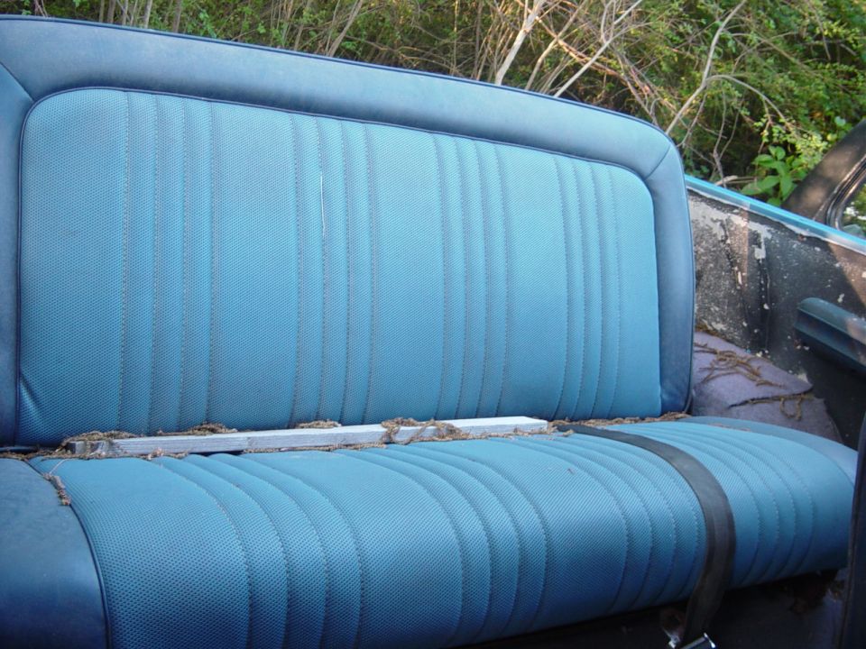 Blue vinyl seat interior with vertical stitching