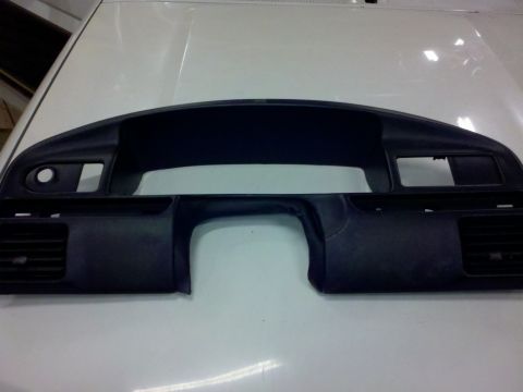 1979 Ford Bronco - This is a dashboard part, likely from a car's interior, air vents and space for instrument clusters.