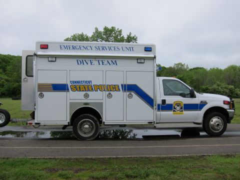1991 Ford LTD Crown Victoria - Side view of a white Connecticut State Police Emergency Services Unit Dive Team box truck with blue and yellow striping.