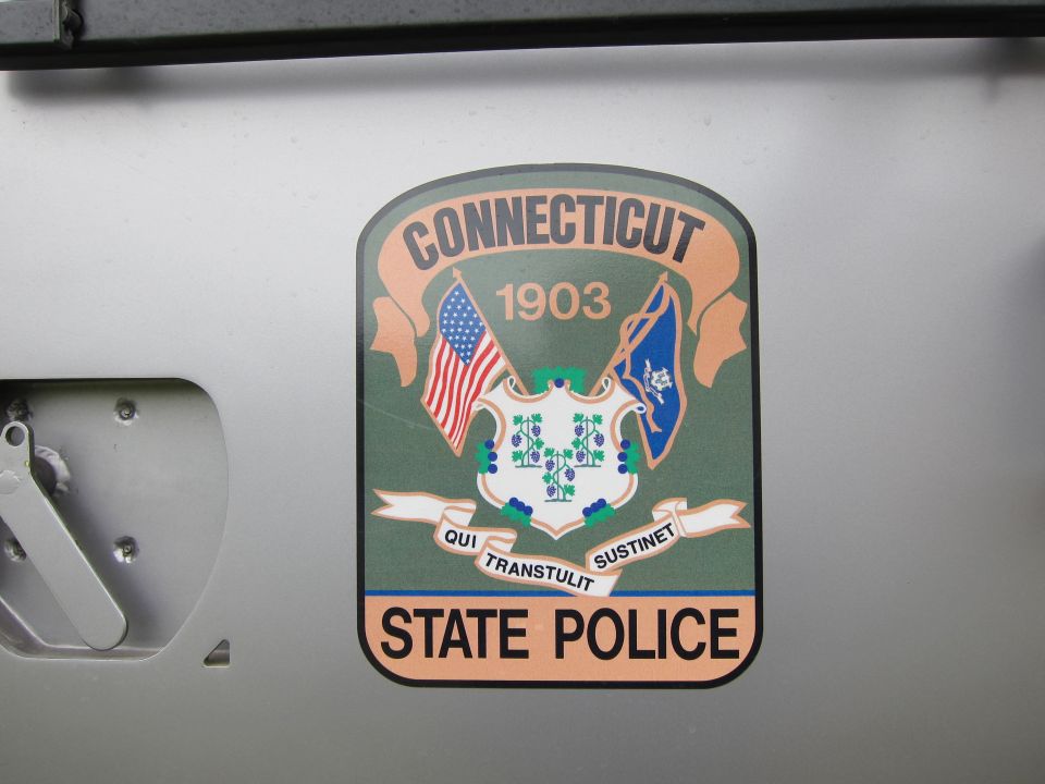 Connecticut State Police 1903 shield decal on a gray vehicle panel