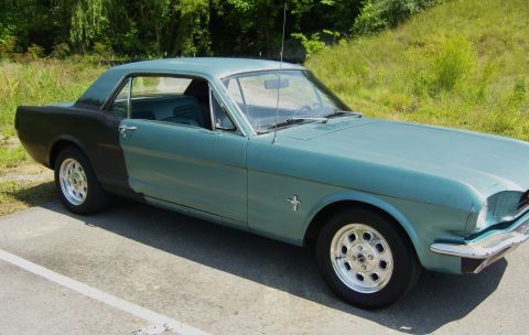 2007 Ford Mustang - This 1965 Ford Mustang coupe has a two-tone paint scheme with the front in teal and the rear in black.