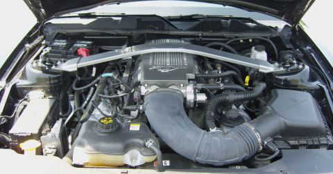 2007 Ford Mustang - The engine compartment of a Ford Mustang, the V8 engine and intake system.
