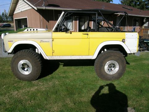 1966 Ford Bronco - This 1966 Ford Bronco features a custom hood scoop and an external roll cage.