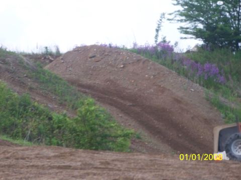1989 Ford Bronco - Construction site scene with dirt mounds and a partial view of a vehicle tire. Date stamp indicates 01/01/2008.