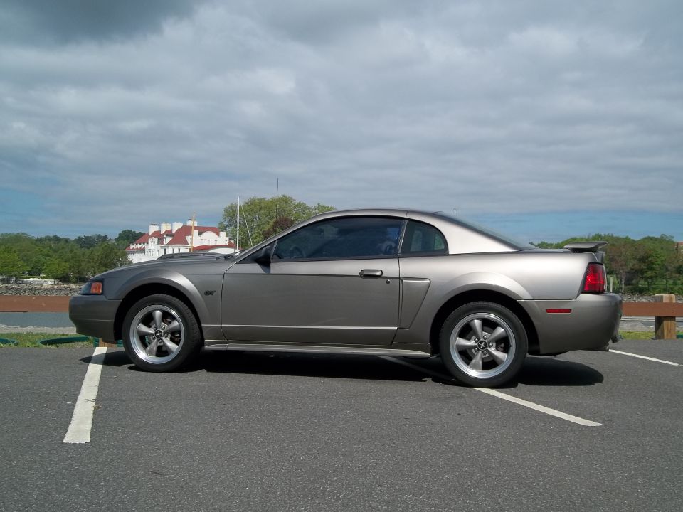 Gray 2002 Ford Mustang coupe parked curbside