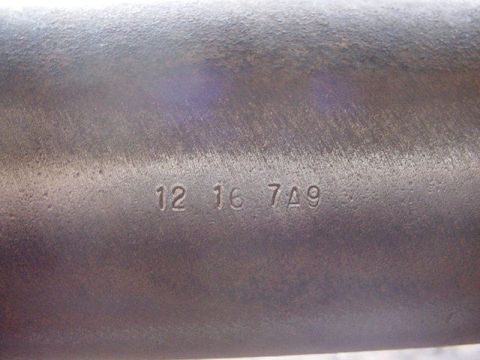 1992 Ford Bronco - A close-up view shows stamped numbers on a metal part.