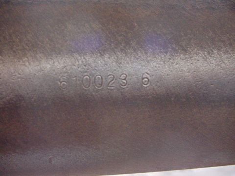 1992 Ford Bronco - Close-up of a metal part showing stamped identification numbers.