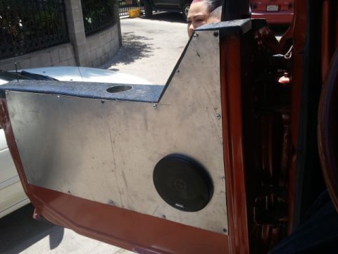1978 Ford Bronco - This photo shows a custom door panel with a speaker and a cup holder, not a 1978 Ford Bronco.