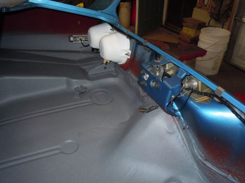 1972 Chevrolet Camaro - The interior of a 1972 Chevrolet Camaro is shown with a freshly painted floor and blue metal accents.