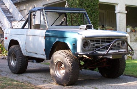 1973 Ford Bronco - This 1973 Ford Bronco has a custom front bumper and a hood scoop.