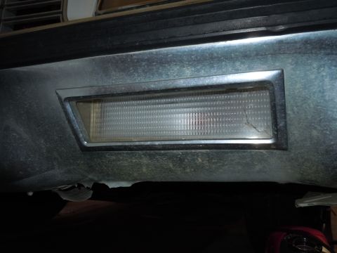 2001 Ford Crown Victoria - Close-up of the front bumper on a 2001 Ford Crown Victoria, highlighting a damaged turn signal.