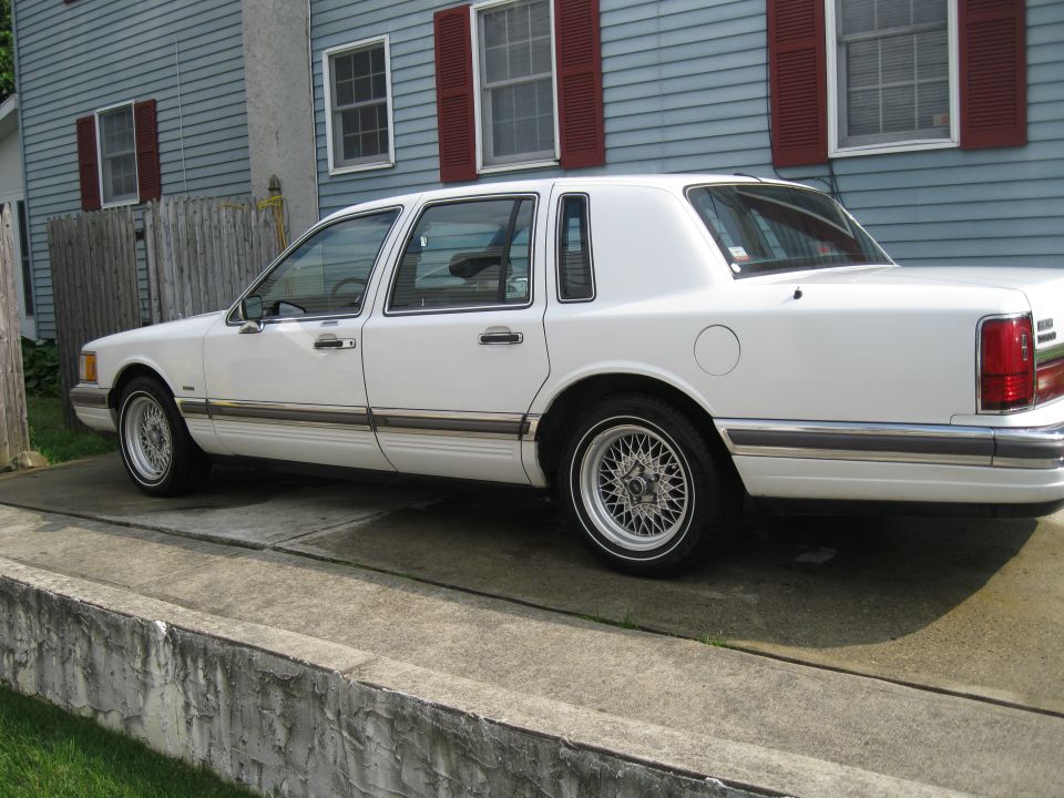1990 Lincoln Town Car parked on driveway