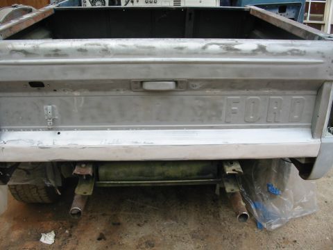1969 Ford Bronco - tailgate back from brothers house and patches made. skim coat of bondo over lower edge. no perfect but happy with it!