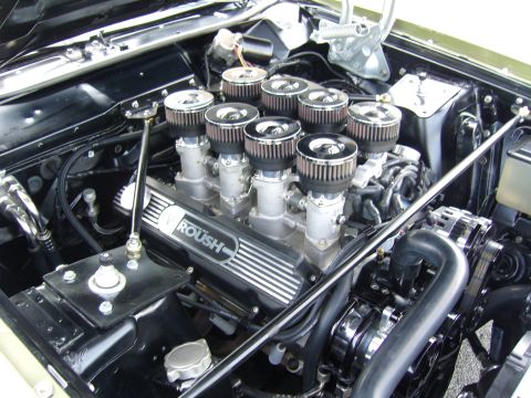 2007 Ford Mustang - Close-up of a V8 engine Roush valve covers and individual air filters.