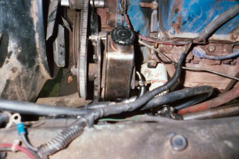 1978 Ford Bronco - Engine bay components including power steering pump and oil filter are visible in this close-up shot.