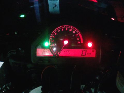 2006 Honda CBR-RR - The digital dashboard of a motorcycle displays the time as 10:28 and the speed as 0 mph.