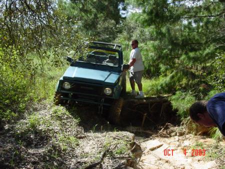 1991 Ford Bronco - Stock Samari with Swampers. The little thing was tearing it up.