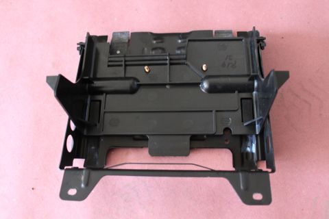 2003 Ford Crown Victoria - This black plastic part has visible text that reads '76 6rd'.