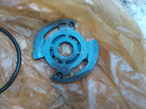 1998 Ford Crown Victoria - A power steering pump rotor and O-ring are shown, likely for a vehicle part replacement.