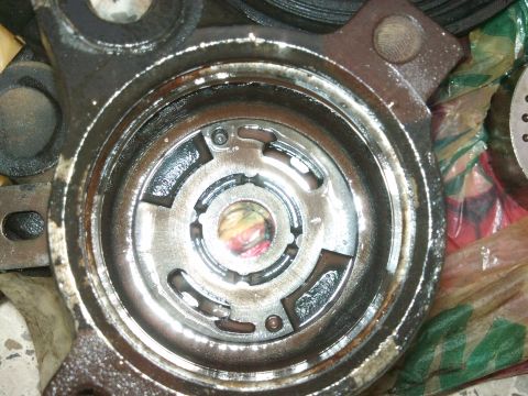 1998 Ford Crown Victoria - This is a close-up view of a used power steering pump part, likely from a Ford Explorer, not a Crown Victoria.