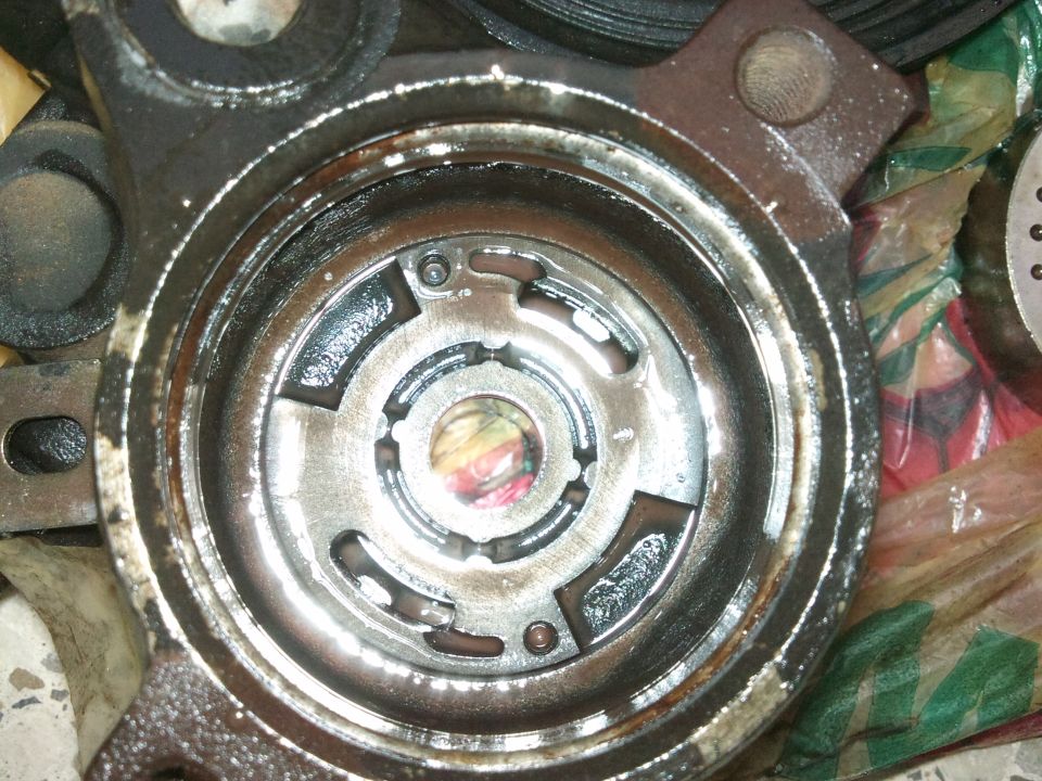 Close-up of a used power steering pump part