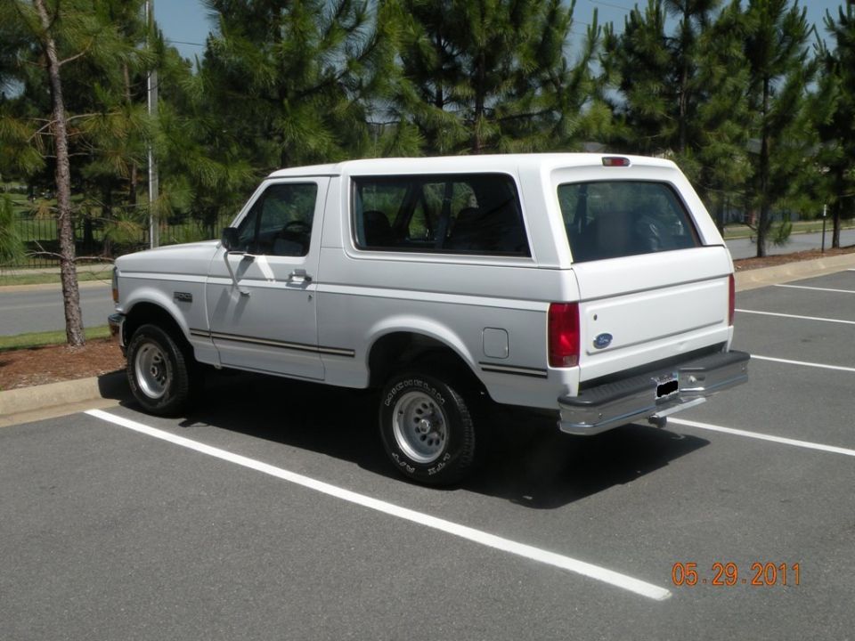 White 1996 Ford Bronco parked in a lot