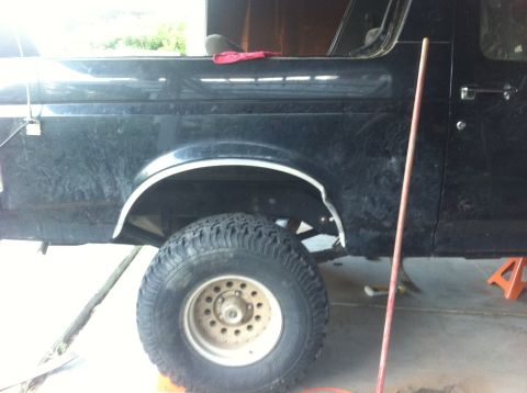 1990 Ford Bronco - This 1990 Ford Bronco is shown in a side profile, a lifted suspension and oversized tires.