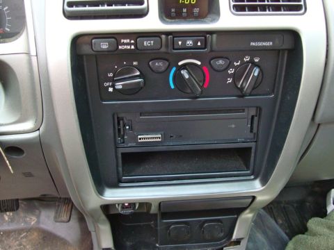 2002 Toyota 4Runner - The interior of a 2002 Toyota 4Runner, focusing on the dashboard's climate controls and entertainment system.