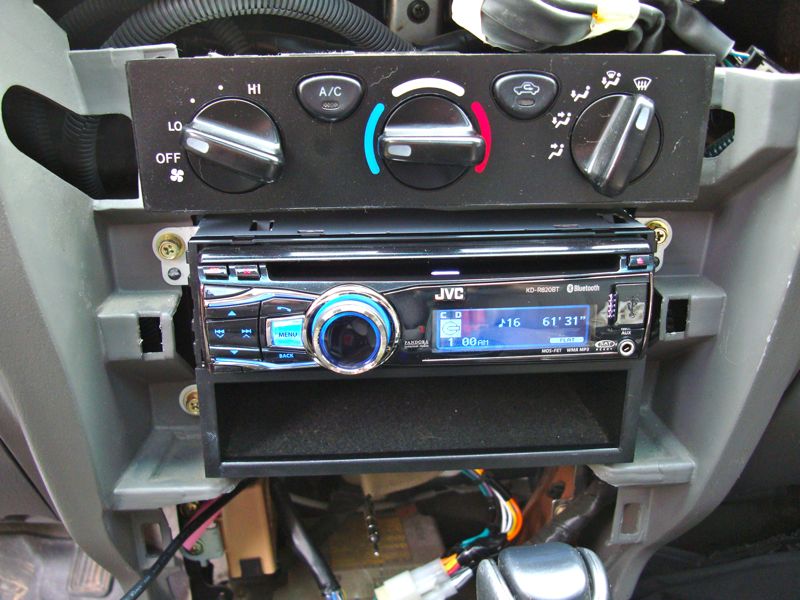 Car interior showing JVC stereo and climate controls