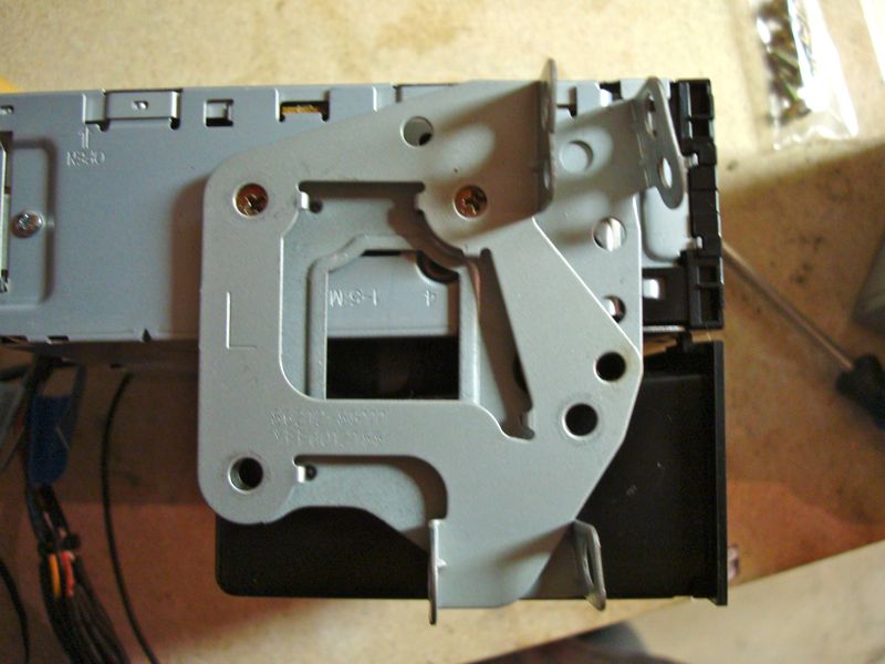 Car stereo mounting bracket with wires attached