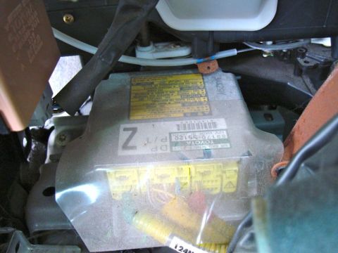 2002 Toyota 4Runner - Close-up of a Toyota airbag sensor module, part number 89170-5120, showing connectors and wiring.
