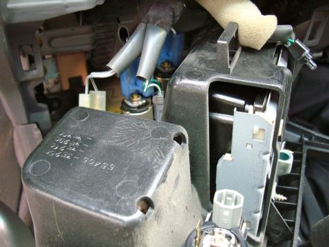 2002 Toyota 4Runner - This photo shows the interior wiring and plastic components of a vehicle, with a visible part number.